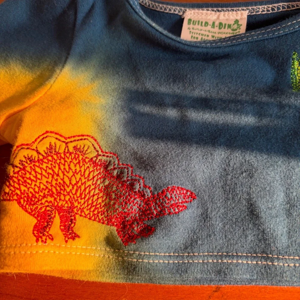 Build-A-Dino Build-A-Bear Tie Dye Dinosaur Embroidered Plush Shirt Blue Yellow